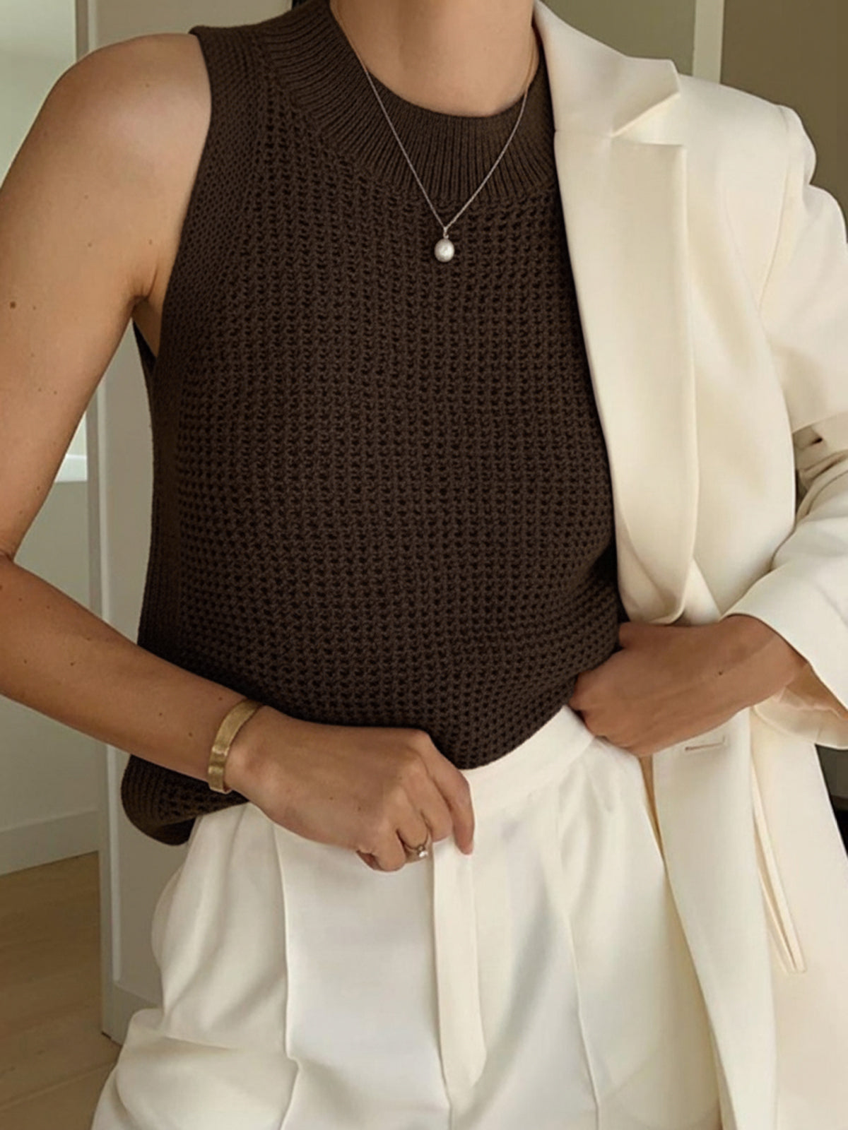 Camiseta sin mangas de punto hueco y sólido