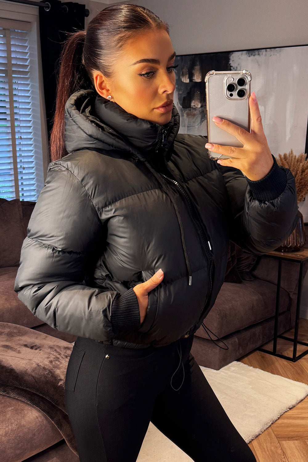 Chaqueta acolchada con capucha negra