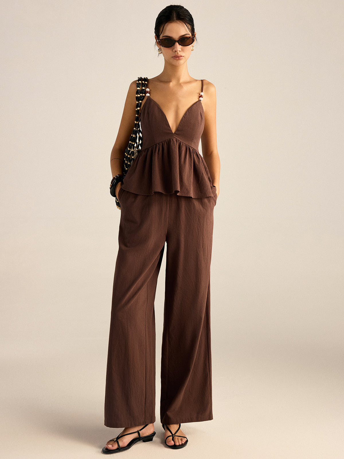 Conjunto de top y pantalones con tirantes y peplum de algodón