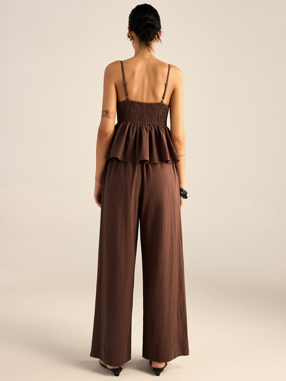 Conjunto de top y pantalones con tirantes y peplum de algodón