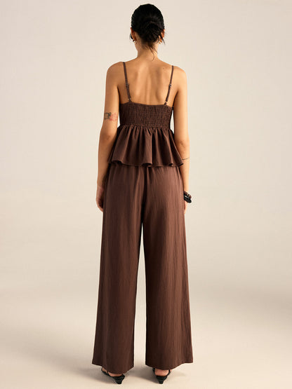 Conjunto de top y pantalones con tirantes y peplum de algodón