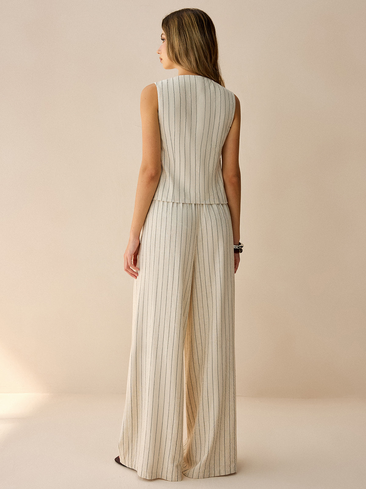 Conjunto de chaleco sin mangas a rayas y pantalones