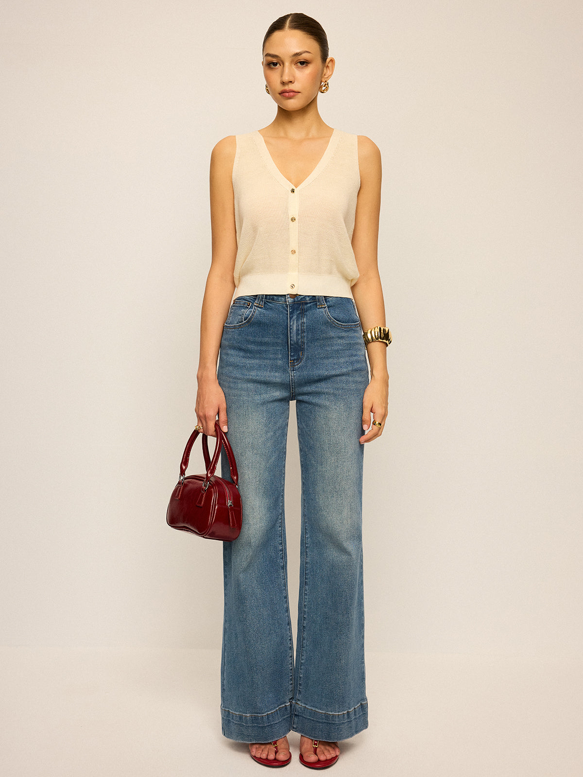 Camiseta sin mangas de punto con cuello en V y botones