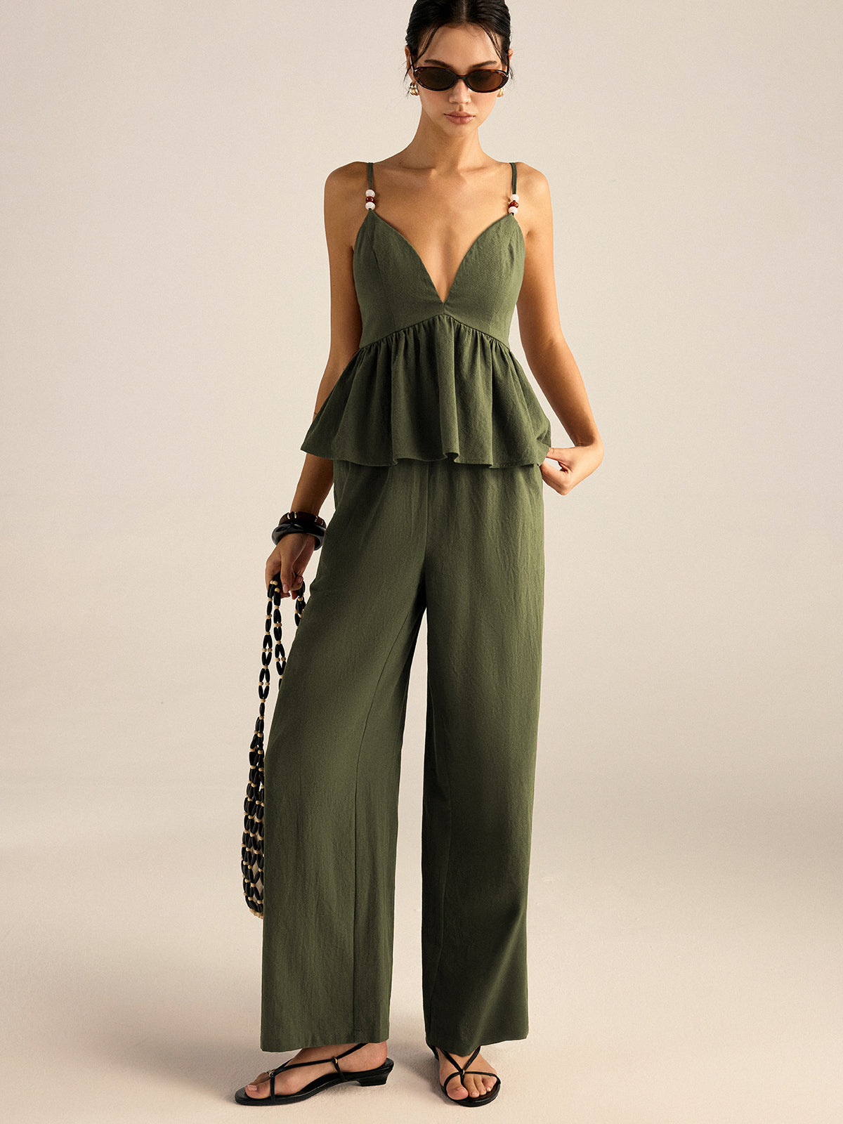 Conjunto de top y pantalones con tirantes y peplum de algodón