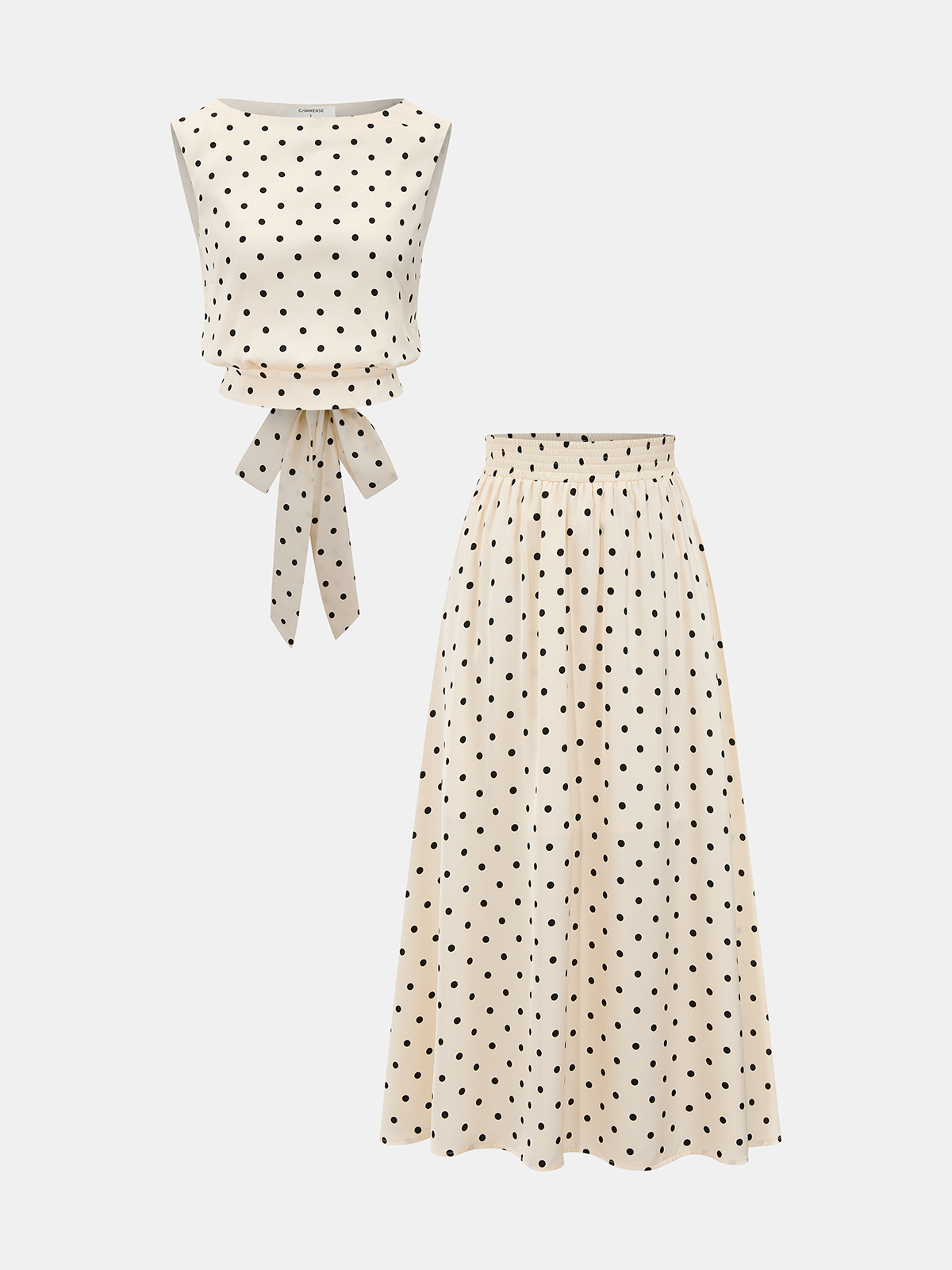 Conjunto de top sin mangas de lunares y falda larga