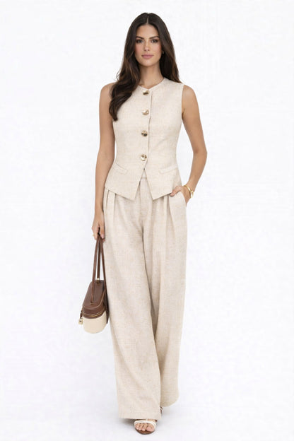 Conjunto de chaleco con botones metálicos y pantalones anchos
